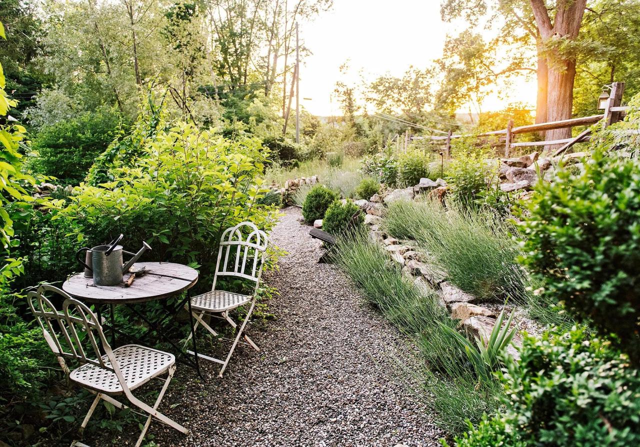 english garden bistro set stones tiers gravel path grasses